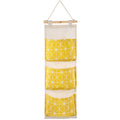 Yellow three-pocket fabric organizer